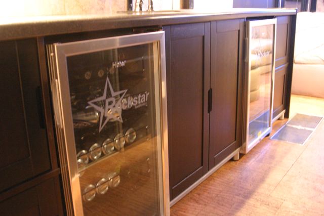 Glass-front refrigerators etched with the Rockstar logo